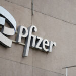 Pfizer lifts profit view on cost cuts, smaller drop in demand for COVID products
